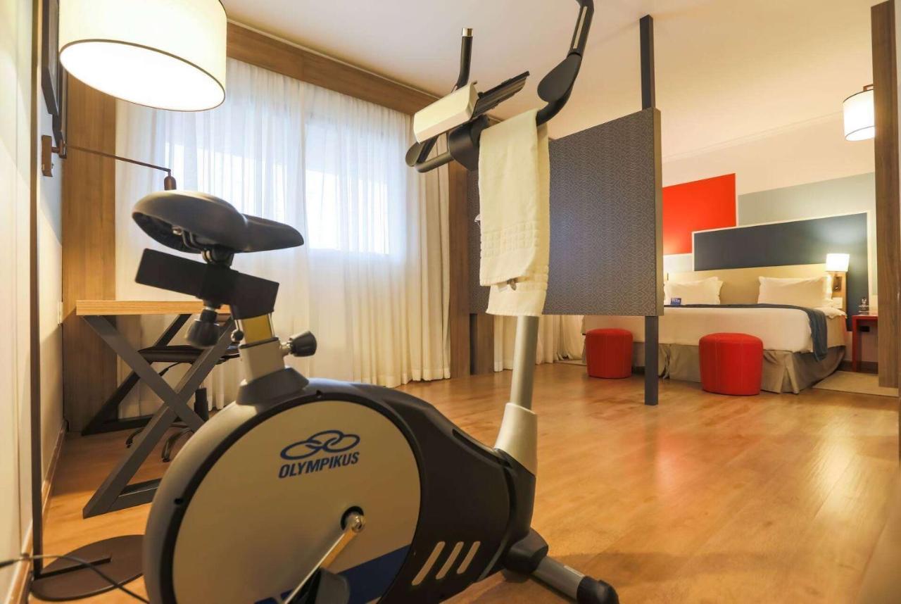트립 바이 윈덤 리베이라오 프레토 호텔 리베이라오프레토 외부 사진 An exercise bike in a hotel room